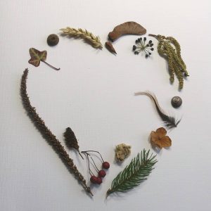 Heart shape made from every day garden objects